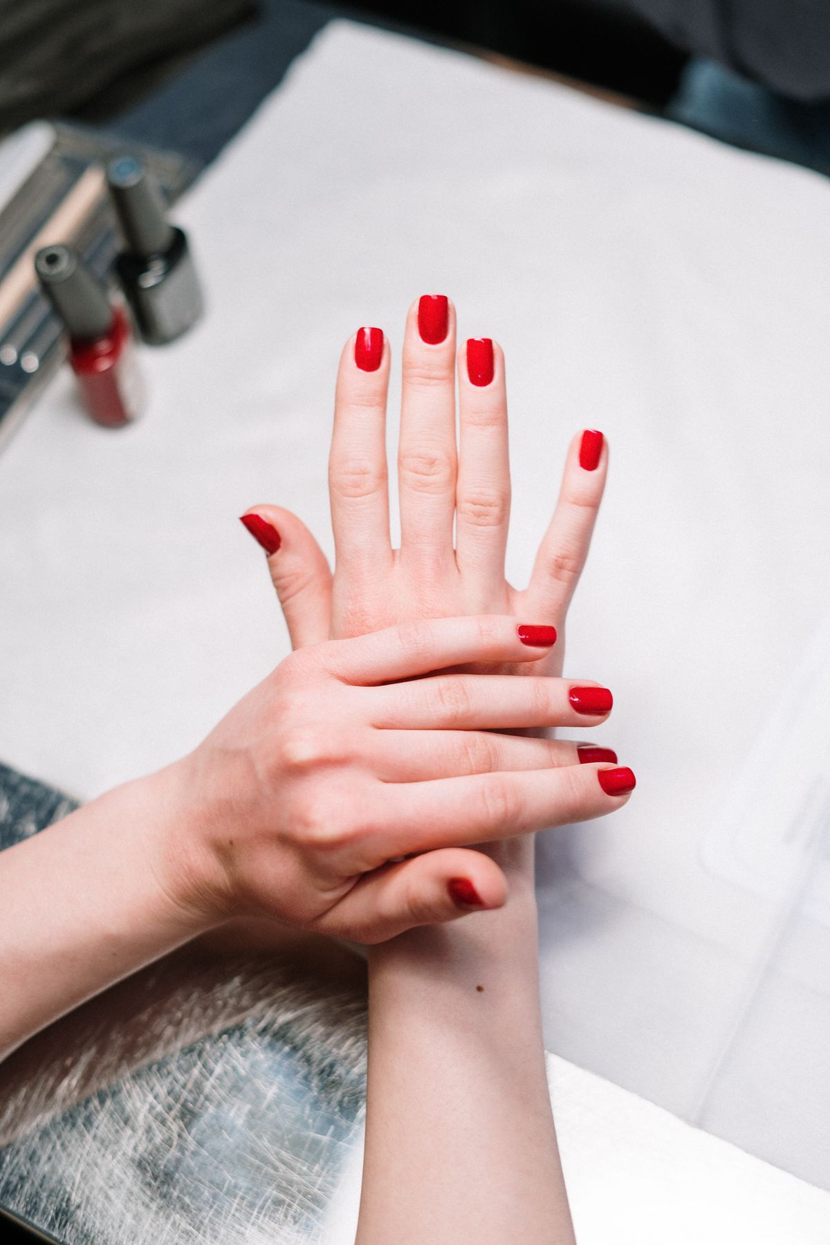 Finished red manicure by Ann's Nail Salon